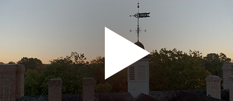 Aerial view of the Wren Building roof with a Play icon overlayed